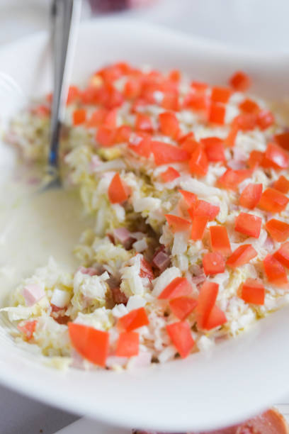 istock Vegetable Vegetable Salad. Fresh vegetable salad isolated on white 1203252874