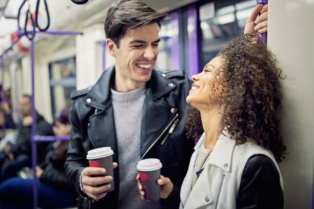 Happy couple is talking in the subway