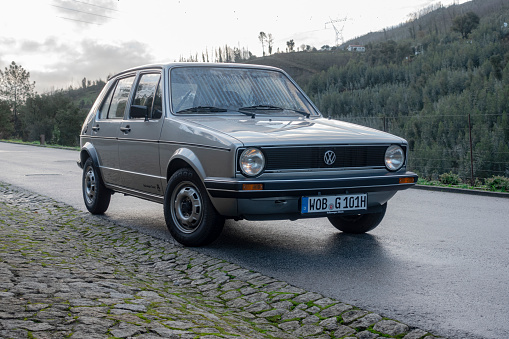 Raiva, Portugal - 11 December, 2019: Classic Volkswagen Golf I (1974-1993) stopped on a street. This model was the most popular Volkswagen vehicles in 70s and 80s.