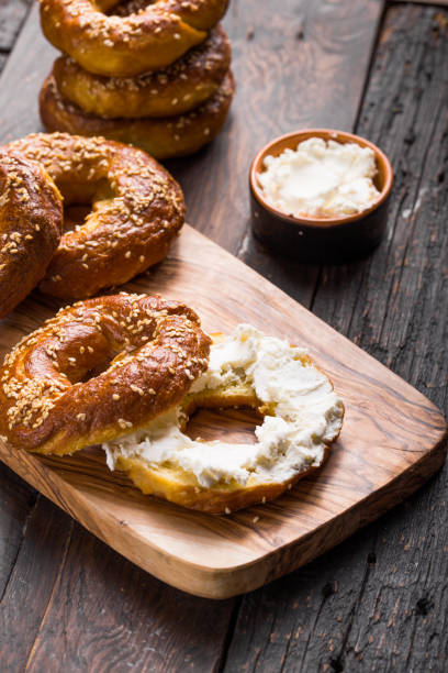 istock Bagels sandwich with cream cheese on wooden table 1203255645