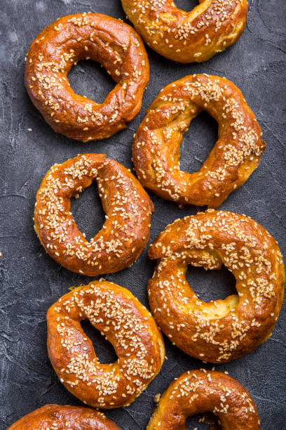 istock Bagel sesame golden bake color, soft inside, crispy outside. top view 1203255768