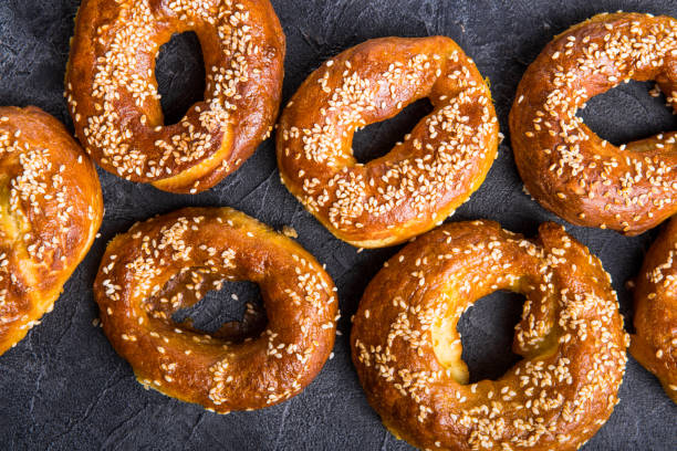 istock Bagel sesame golden bake color, soft inside, crispy outside. top view 1203255781