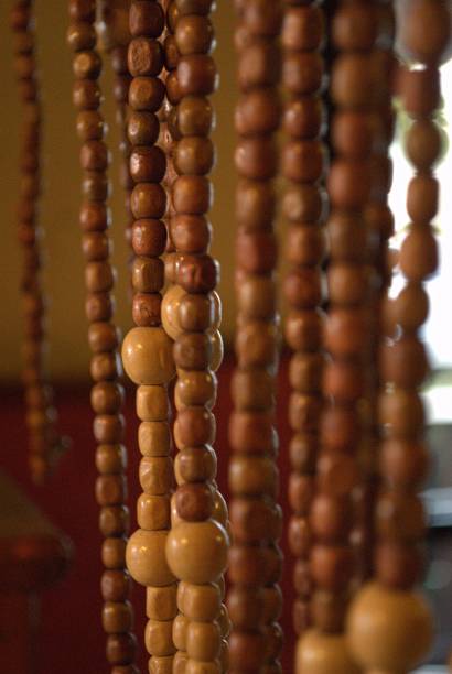 istock Rows of wooden bead necklaces, soft shot 1203262284