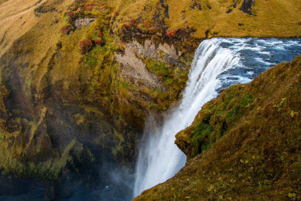 istock Waterfall by the side of a mountain 1203263245