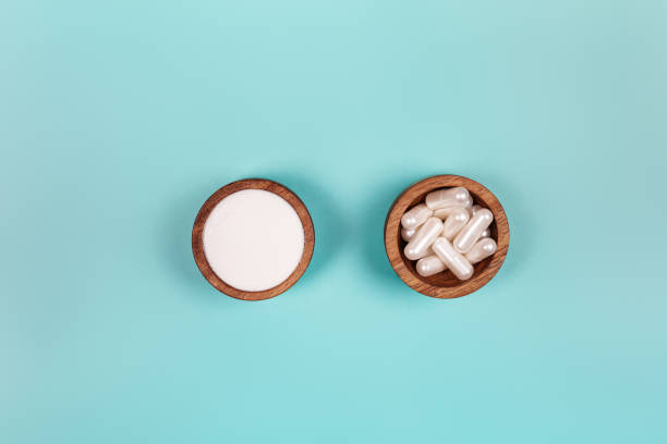 istock Collagen in capsules and in powder 1203267038