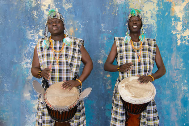 istock Two African musician with traditional clothes and drums 1203267546