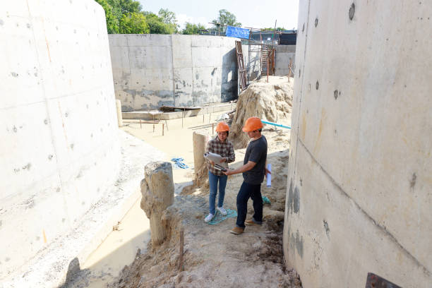istock Construction concept of Engineer and Architect working at Construction Site with blue print 1203281029