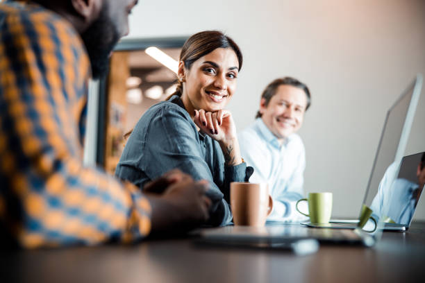 istock Charming office worker demonstrating her sincere smile 1203282757