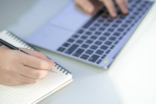 istock Woman working at home office using laptop searching web, browsing information 1203284454