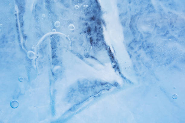 istock Abstract frozen water.Ice texture winter background 1203289323