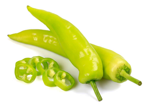 istock Raw Green Organic Shishito Peppers  isolated on white background 1203290313