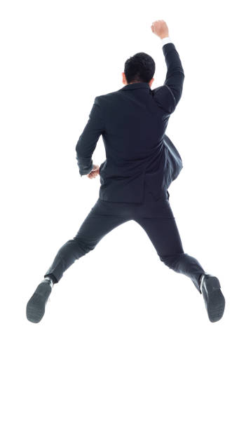 istock East asian ethnicity young male jumping 1203293706