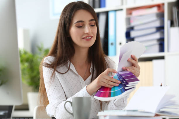 istock Businesslady imagining project of house 1203296119