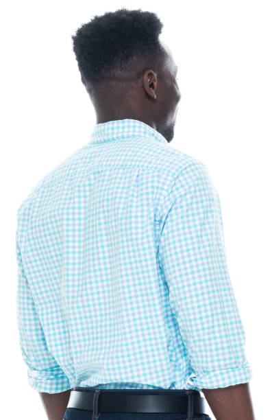 istock Generation z young male standing wearing button down shirt 1203296393
