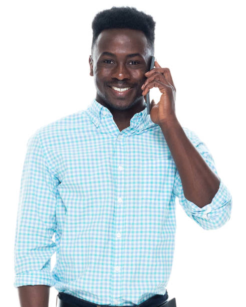 istock African ethnicity male standing wearing smart casual and using mobile phone 1203296492