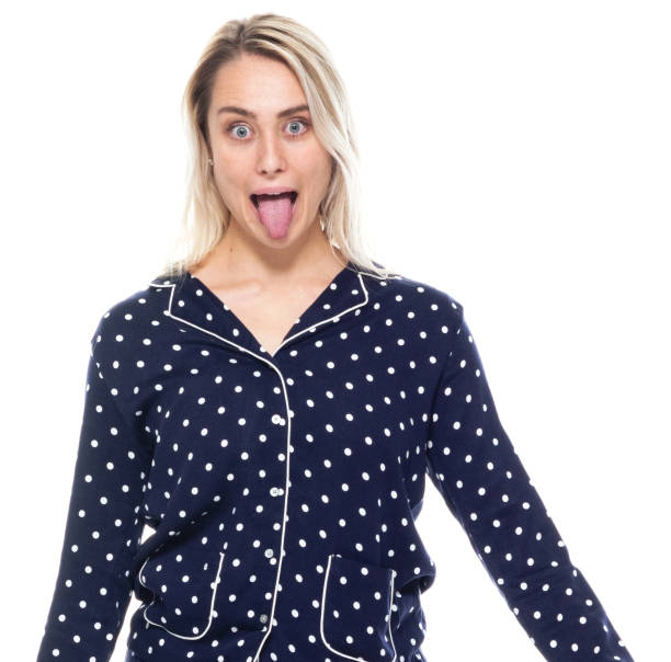 istock Caucasian female standing wearing nightwear 1203298402