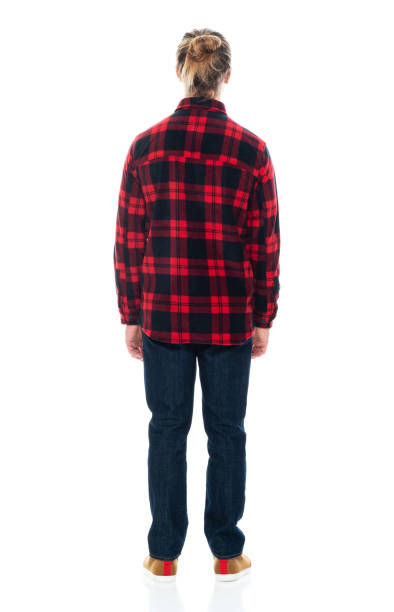 istock Caucasian young male standing wearing jeans 1203298725