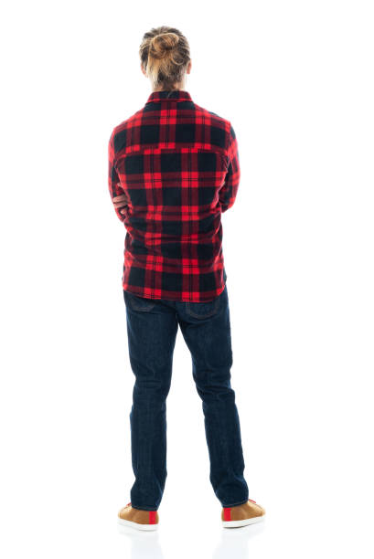 istock Caucasian young male standing wearing jeans 1203298744
