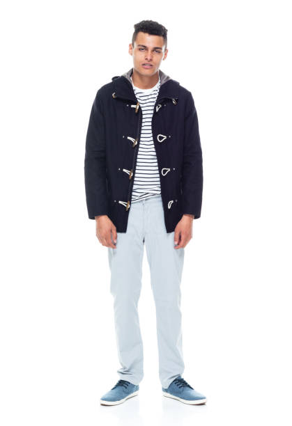 istock African ethnicity male standing wearing jacket 1203299795
