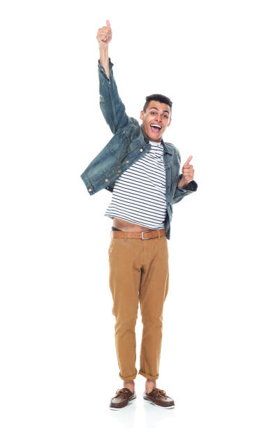 istock African ethnicity male standing wearing denim jacket 1203299868
