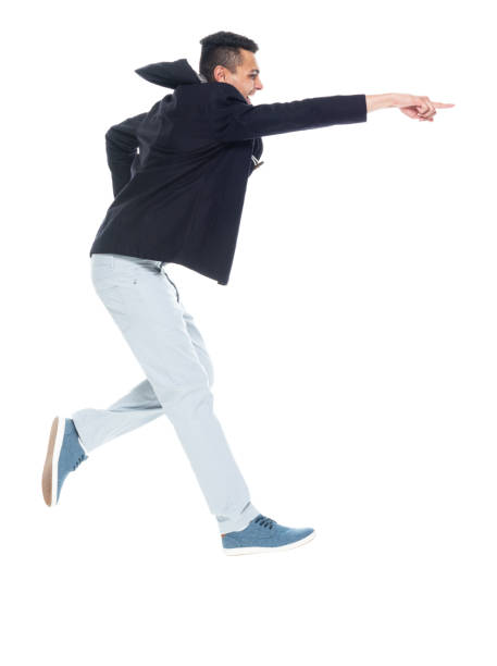 istock African ethnicity male jumping wearing jacket 1203299961