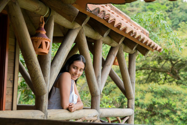 istock Woman on vacation resting in a cabin 1203301177