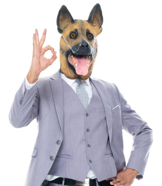 istock African ethnicity young male crouching wearing mask - disguise 1203301366
