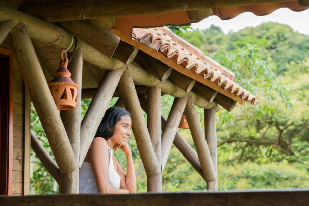 istock Woman on vacation resting in a cabin 1203302058