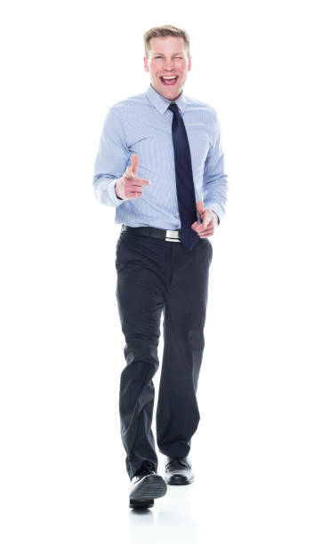 istock Caucasian male businessman walking 1203305214
