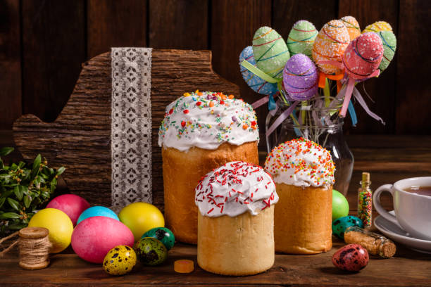 istock Easter cake and colorful eggs on a dark background 1203305411