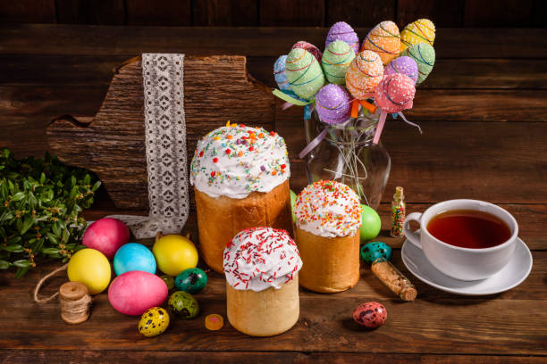 istock Easter cake and colorful eggs on a dark background 1203305497