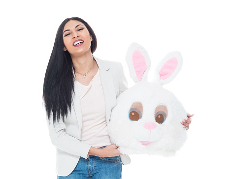 One person of aged 20-29 years old who is beautiful latin american and hispanic ethnicity young women standing wearing mask - disguise who is happy and wearing wearing a rabbit mask mask