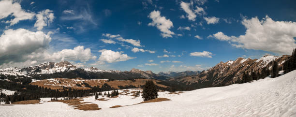 istock Snowy mountains on cloudy day 1203312070