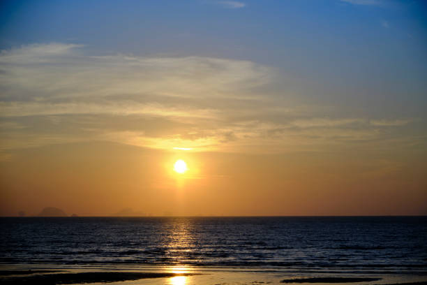 istock Beautiful Sunrise Over the Ocean 1203313245