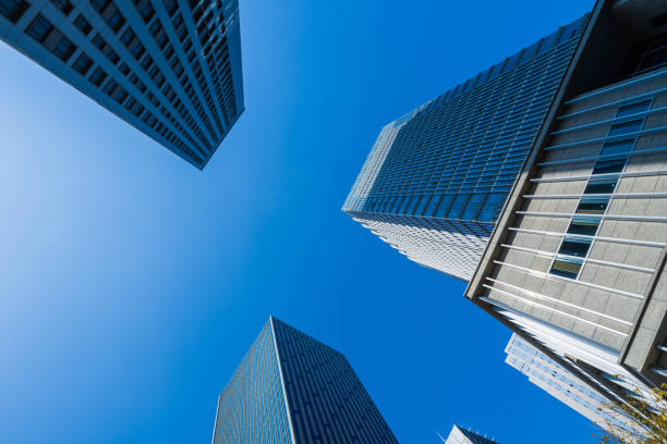 istock High modern skyscrapers over blue sky 1203316487
