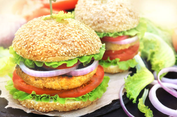 istock Veggie burger with chickpeas patty, vegan fast food 1203321641