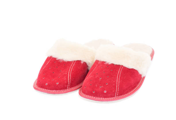 istock Red woman's slippers isolated on white background. 1203322378