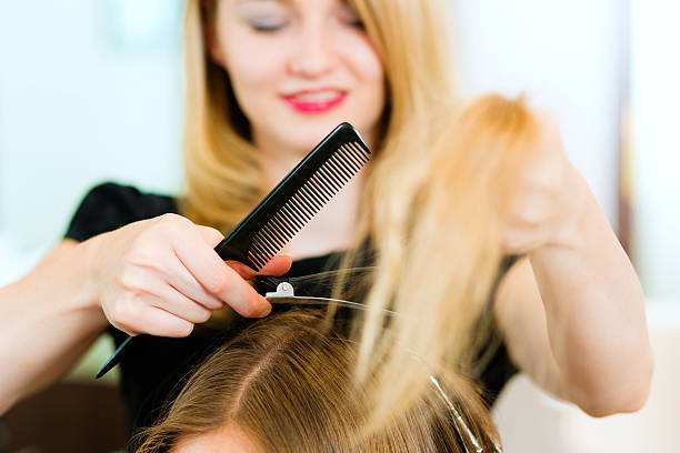istock Woman receiving haircut 120332354