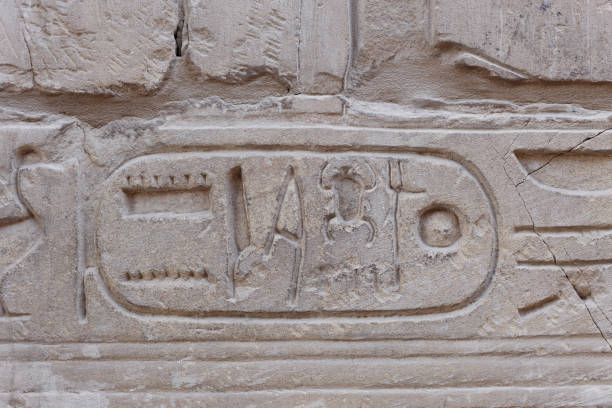istock Egyptian hieroglyphs 1203333536