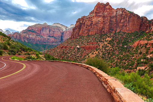 The spectacular Utah Scenic Byway 9 from Springdale to Mt. Carmel Junction cutting through the red and white sandstone wonderland around Checkerboard Mesa, Zion National Park, Utah, Southwest USA.