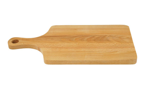 istock Wooden cutting board isolated on white 1203339200