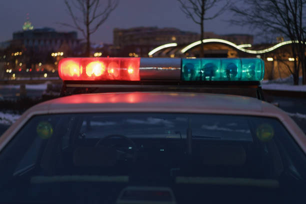 istock Police car in night 1203344283