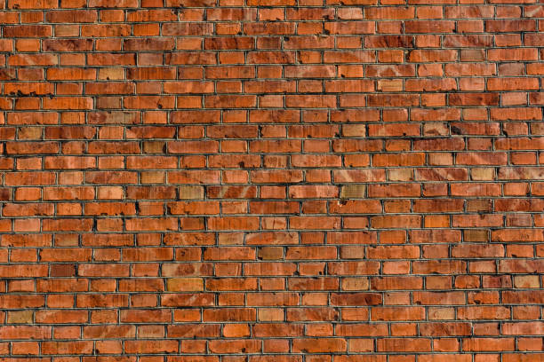 istock Old wall of the red bricks for background 1203345989