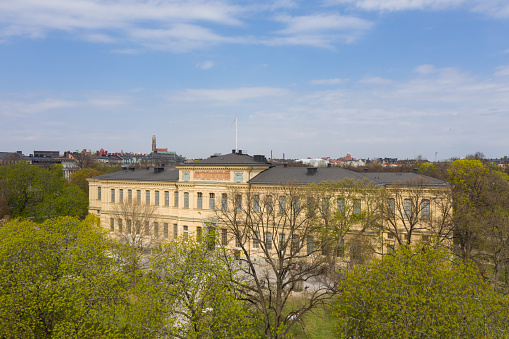 Stockholm, Sweden - April 21, 2019: Humlegarden, the Royal library. Panoramic view. Early  spring with fresh green.