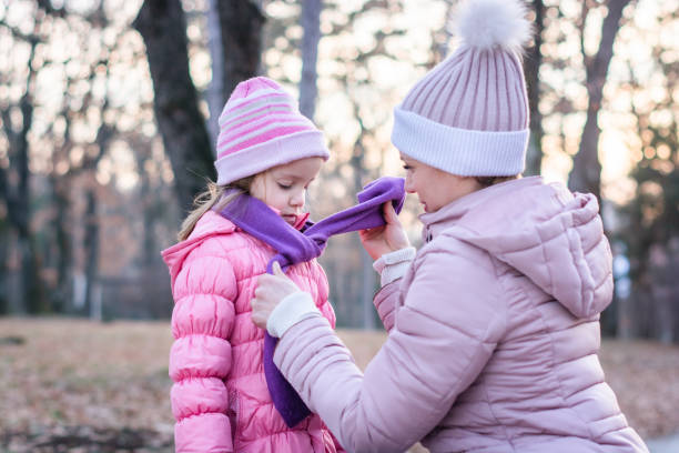 istock Mother and daughter in the park. 1203354754