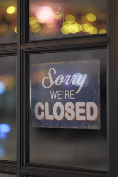 istock Close up of closing sign on window 1203355896