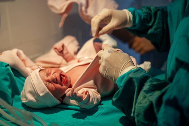 istock Newborn baby crying minutes after birth 1203358202