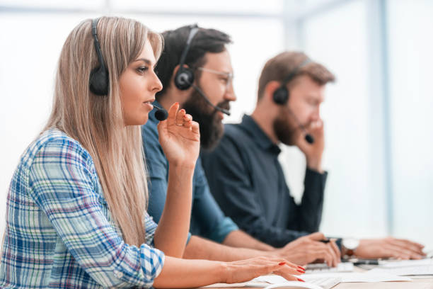 istock young call center employee in the workplace 1203359259
