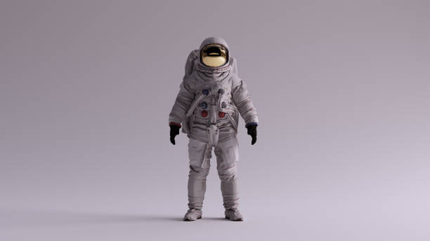 astronauta con visiera oro e tuta spaziale bianca con sfondo grigio chiaro con vista frontale di illuminazione laterale diffusa neutra - astronauta foto e immagini stock