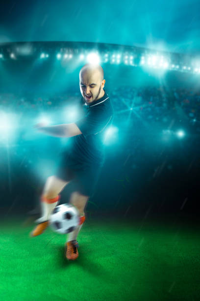 istock soccer player shooting a ball in the game 1203361699